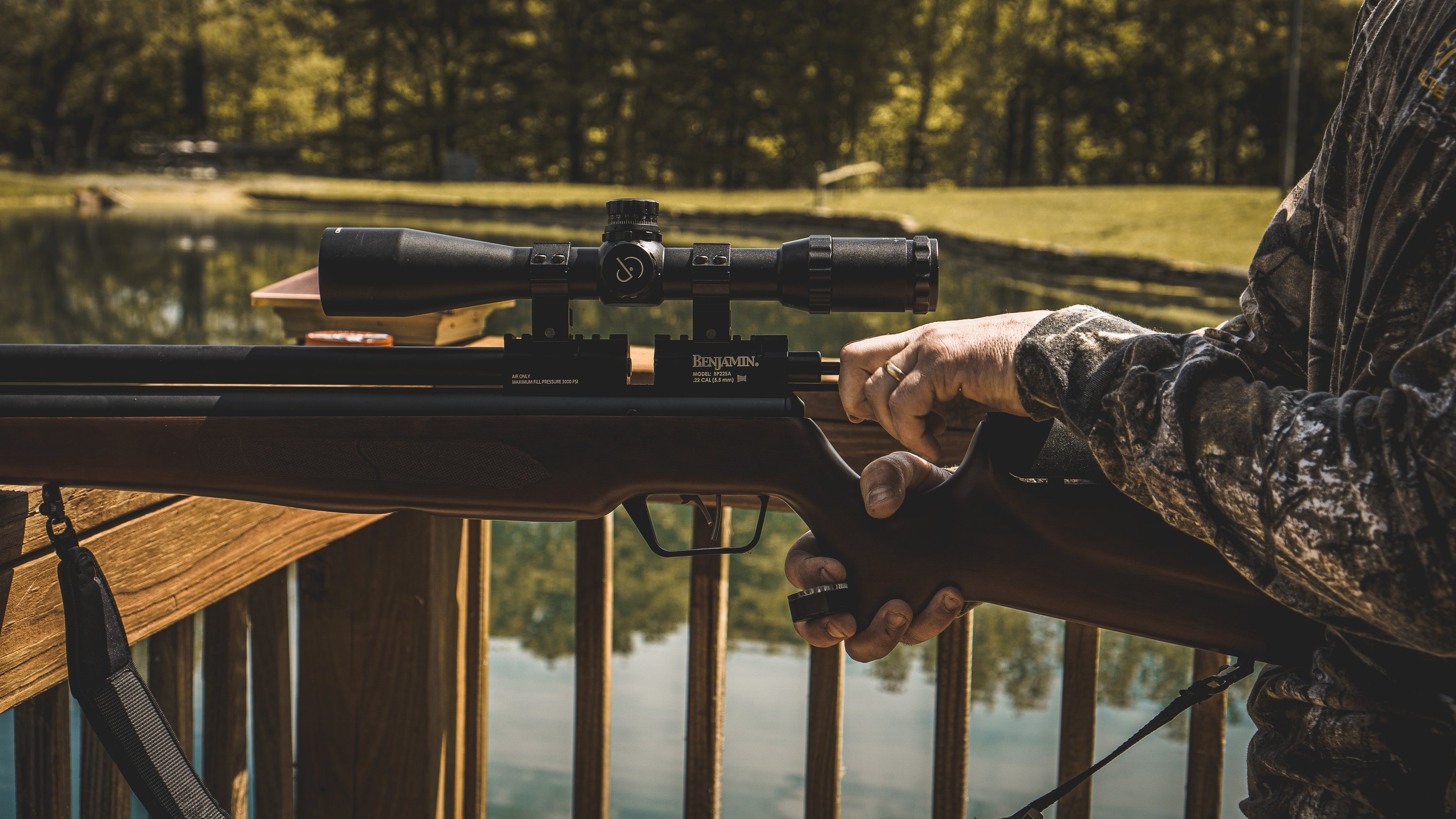 A hunter preparing to shoot a Benjamin Marauder air rifle