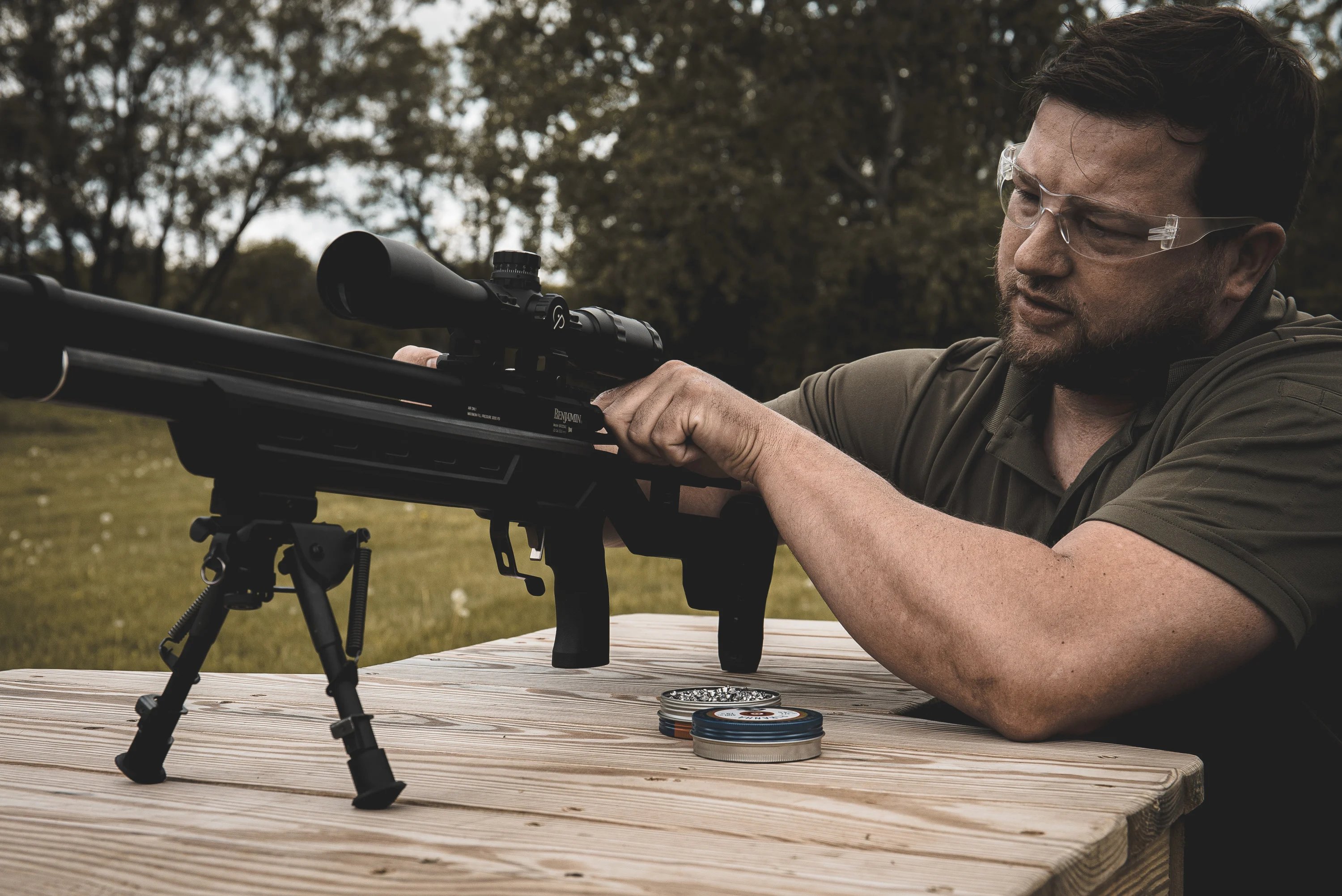 A man preparing to shoot a Benjamin Armada Semi-Automatic tactical air rifle